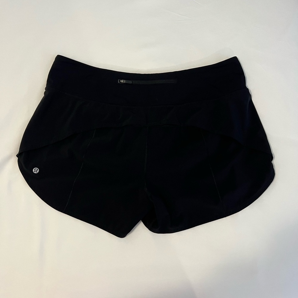 Lululemon women’s black running shorts, size 14 (fits like a 12)